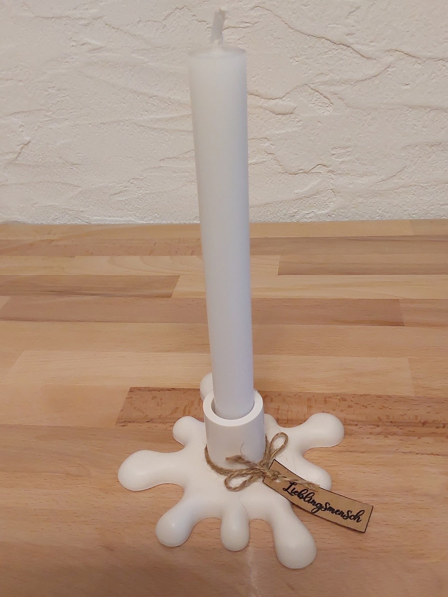 Farbklecks als Kerzenhalter in Gelb, Grau und Weiß