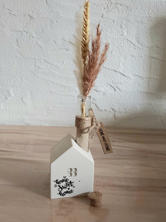 Häuschen mit Blumenhalter